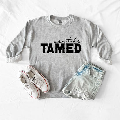 Can't Be Tamed Graphic Sweatshirt